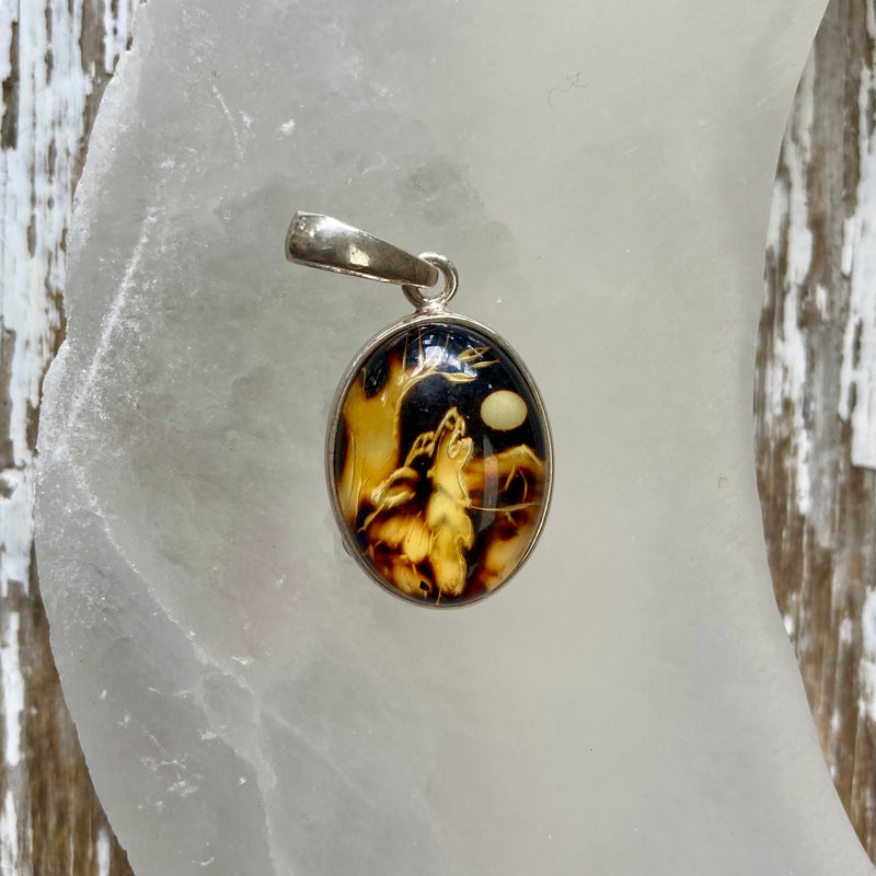 Hand Carved Amber Howling Wolf Sterling Silver Pendant