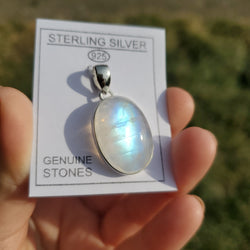 Oval Rainbow Moonstone set in Sterling Silver Crystal Pendant