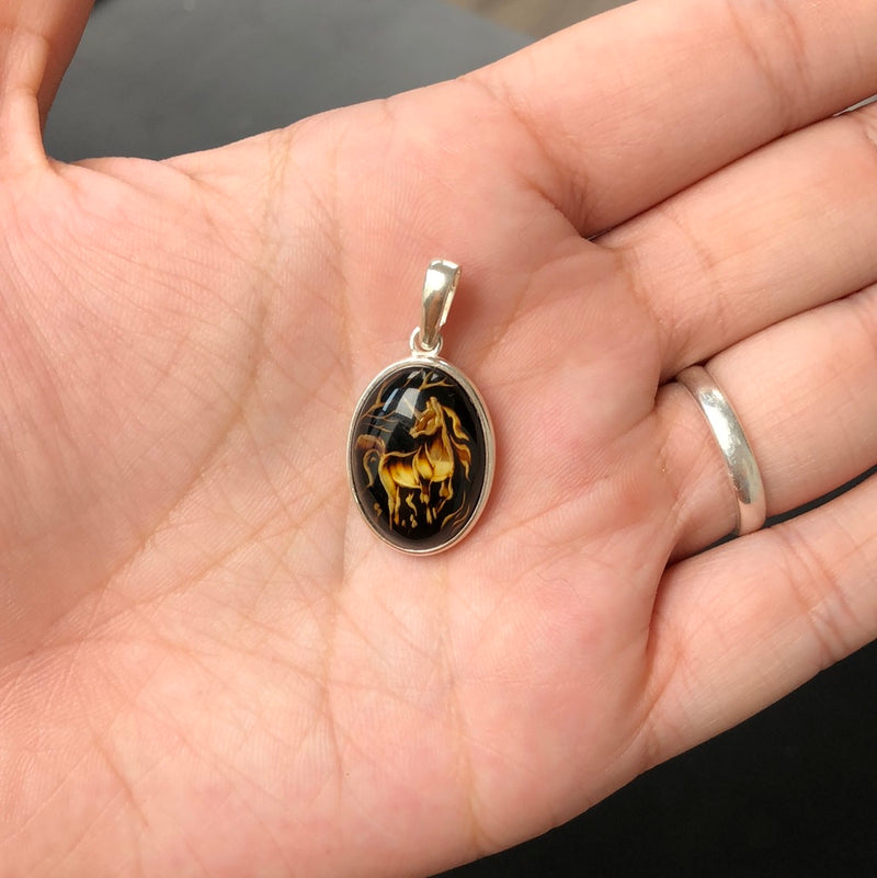 Hand Carved Amber Unicorn Sterling Silver Pendant