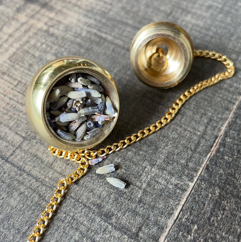 Gold Pendulum with Compartment